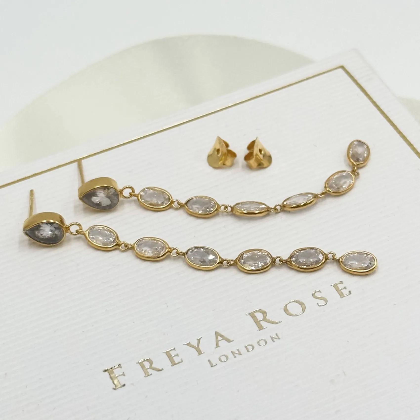 Freya Rose Gold Prom Jewellery | Prom Earrings*Oval Crystal Gold Framed Long Drop Earrings