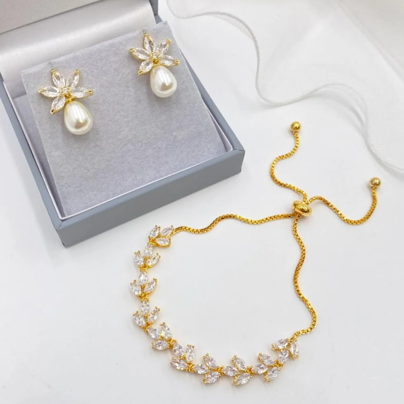 Lace & Favour Pearl Jewellery | Gold Wedding Jewellery*Sahara Gold Crystal Leaves and Teardrop Pearl Earrings Ivory/ Gold