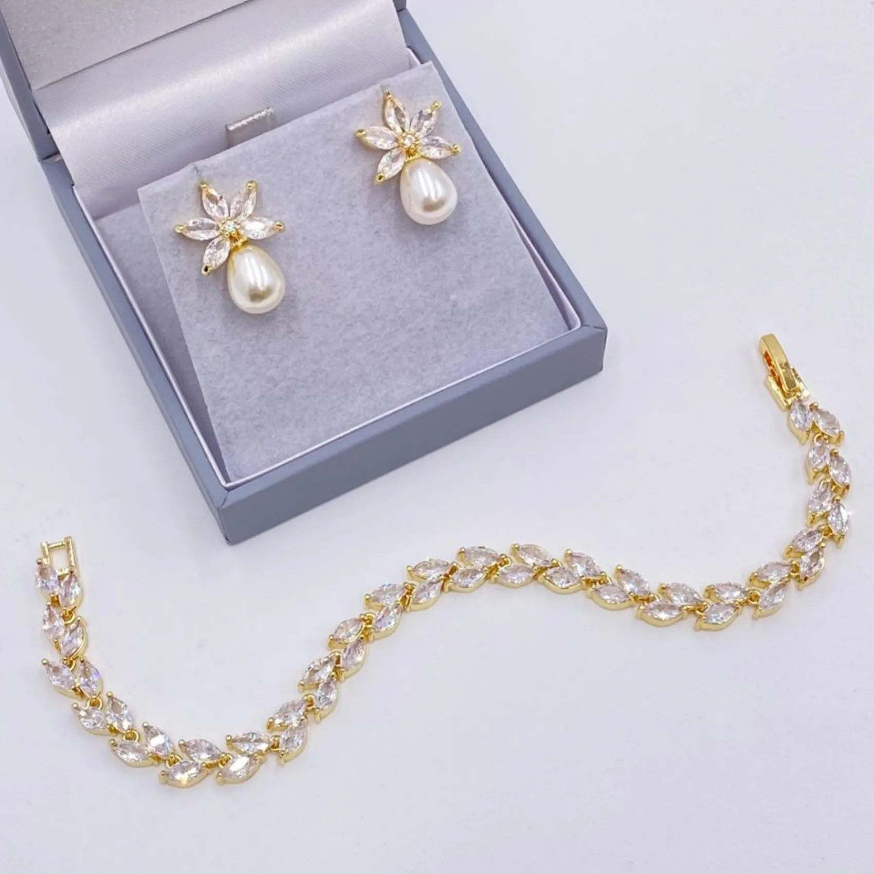 Lace & Favour Pearl Jewellery | Gold Wedding Jewellery*Sahara Gold Crystal Leaves and Teardrop Pearl Earrings Ivory/ Gold