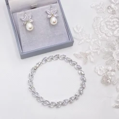 Lace & Favour Pearl Jewellery | Silver Wedding Jewellery*Sahara Silver Crystal Leaves and Teardrop Pearl Earrings Ivory/ Silver