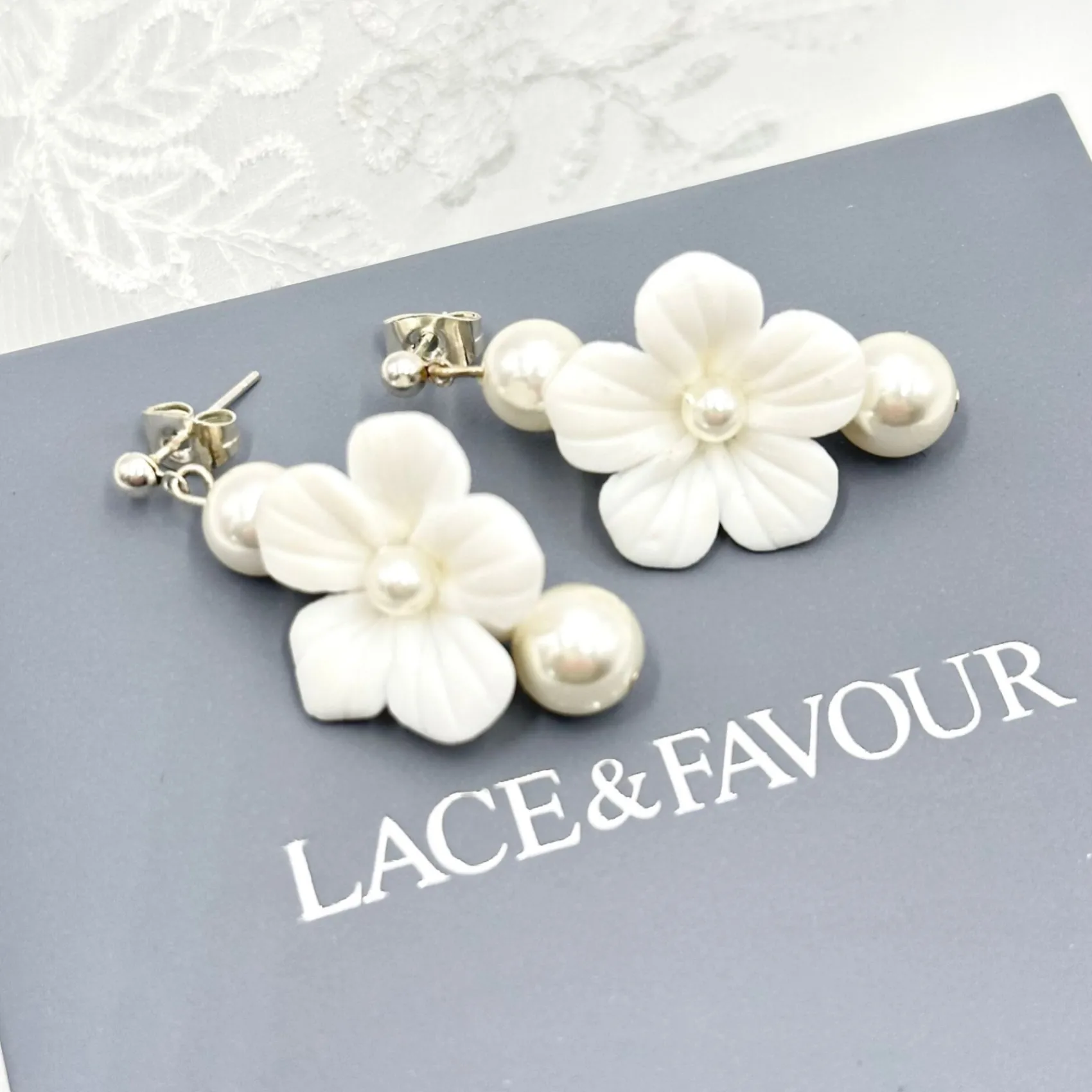 Beads & Beyond Pearl Jewellery | Silver Wedding Jewellery*Trixie Ivory Ceramic Flower and Pearl Drop Earrings Ivory/ Silver