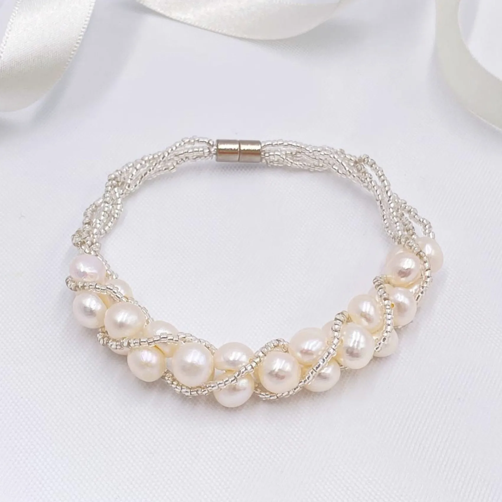 Lace & Favour Pearl Jewellery | Silver Wedding Jewellery*Viniana Twisted Bead and Freshwater Pearl Bracelet Ivory/ Silver